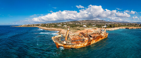 Abandoned Edro III Shipwreck at seashore of Peyia, near Paphos, Cyprus. Historic Edro III Shipwreck site on the shore of the water in Cyprus. Aerial view of Shipwreck EDRO III, Pegeia, Paphos.