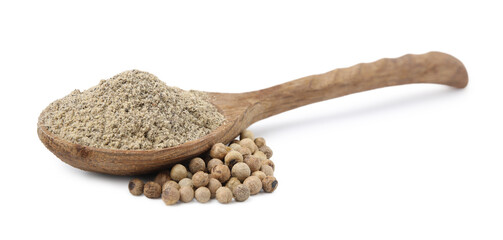 Aromatic spice. Ground pepper in spoon and peppercorns isolated on white