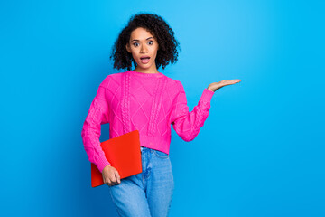 Photo of adorable pretty lady wear pink jumper holding modern gadget showing arm empty space...