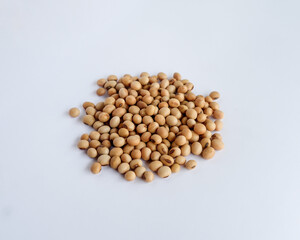 Organic dried soybeans which are full of nutrients, can be used as an ingredient in making food and drinks that are healthy for the body. Isolated on white background.
