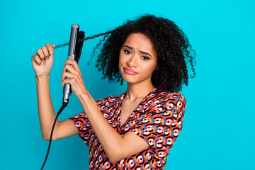 Photo of unhappy upset lady dressed print shirt straighten hair curls isolated turquoise color...
