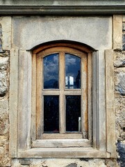 Dooden old window in old city
