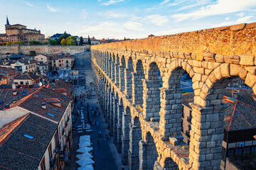 Ancient Roman aqueduct in city of Segovia in Spain