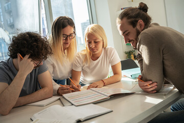 A diverse group of young individuals gathers at the language school to explore new languages and...