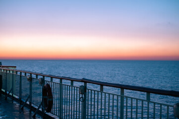 Obraz premium Sunrise from Ferry from Barcelona to Ibiza in summer 2024