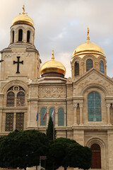 The elaborate facade, roof, cupolas and bell tower of the Dormition of the Mother of God Cathedral in Varna, Bulgaria