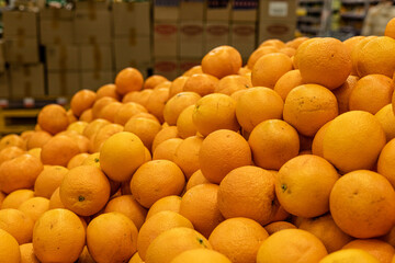 Fresh oranges in a grocery store or in a supermarket