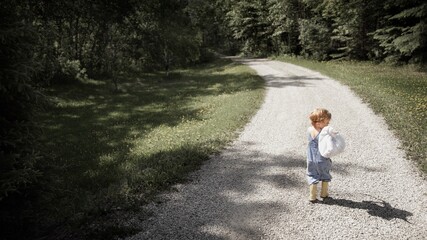 Fototapeta premium Little Boy Running Away