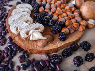 Organic farm superfoods on natural background.