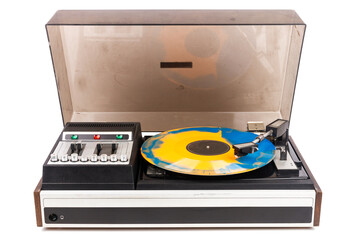 Vintage turntable record player with blue and orange vinyl