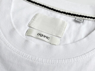 White label with organic word on a white cotton t-shirt