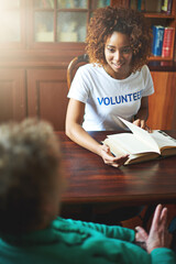 Volunteer, reading and black woman with book in retirement home for community service, social...