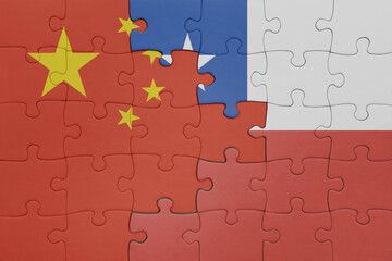 puzzle with the colourful national flag of chile and flag of china .