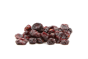 Pile of dried cranberries set isolated on white background. Deep red, wrinkled textures and glossy surfaces, preserved state. Healthy snacks, baking ingredients, or natural food products