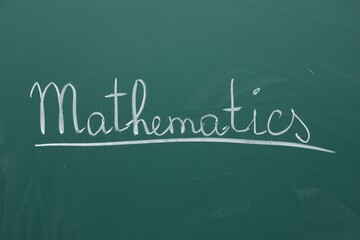 Word Mathematics written with chalk on green board