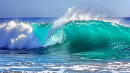  A wave in the ocean under a sunny blue sky, featuring water splashing from crest to trough