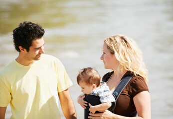 Fototapeta premium Young Family At Lake
