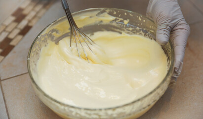 hands delicately layering ingredients to create a luscious tiramisu, showcasing the artistry of homemade desserts