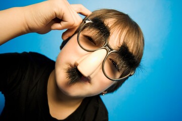 Boy In Groucho Glasses