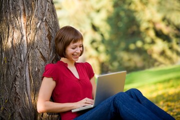 Woman Typing On Laptop