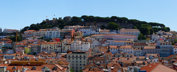 Lisbon cityscape with historic Sao Jorge Castle and Lisboa old town. Panorama of Lisbon.