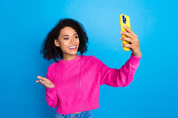 Photo of nice young girl smart phone make selfie wear pink sweater isolated on blue color background