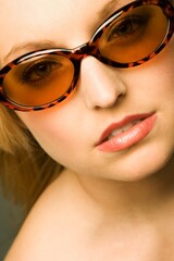 Young Woman Wearing Tortoiseshell Sunglasses