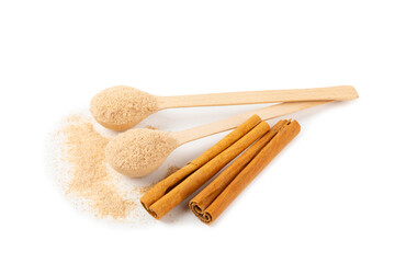 Cinnamon sugar isolated on white background. Homemade cinnamon sugar in a bowl on background. Brown sugar. Spice mixture for drinks and baking. Place for text. Copy space.