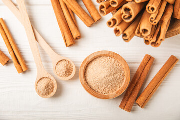 Cinnamon sugar on a texture background. Homemade cinnamon sugar in a bowl on background. Brown sugar. Spice mixture for drinks and baking. Place for text. Copy space.