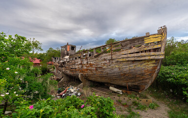 Abandoned old fishing boat, Baltic sea coast