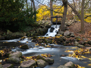 Waterfall in Oliwa Park in autumn, Baltic Coast © Michał Brzostowski 