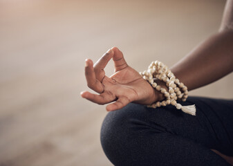 Hand, person and bracelet with gyan mudra in yoga class for zen, meditation and chakra in studio....