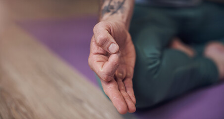 Hands, yoga or person in home for meditation, wellness or spiritual care in lotus pose or zen...