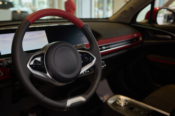 Vehicle with seating and steering wheel, interior design