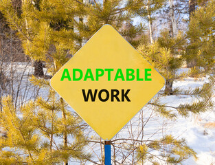 Adaptable work symbol. Concept words Adaptable work on beautiful yellow road sign. Beautiful forest...