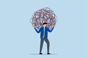 Stress burden, tired exhausted businessman carrying heavy tangled rope on his back.