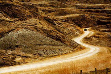 A Car Running On Curving Road