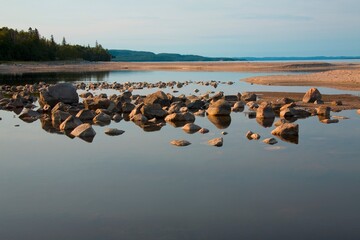 Water With Rocks And A Sandbar