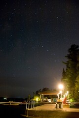 Cottage Dock Lit Up At Night, Lake Of The Woods, Ontario, Canada