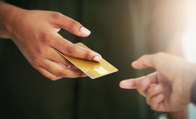 Credit card, payment and customer with hands or giving to cashier, exchange with gift voucher at...
