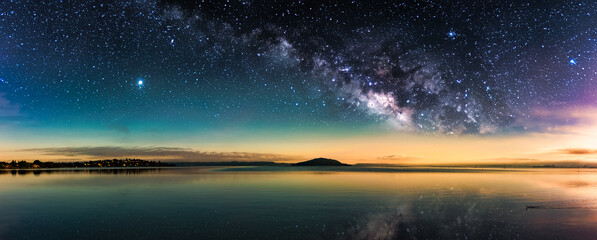 Starry night sky over the sea