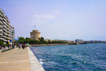 The promenade along the Mediterranean Sea with the White Tower in the background in Thessaloniki -...