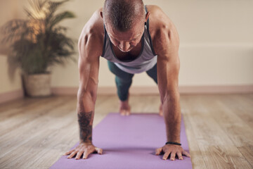 Man, yoga or high plank for health, wellness or body flexibility for practice routine with...