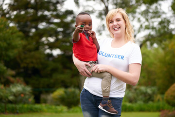 Woman, child and portrait for volunteering at charity for kids and community service in park....