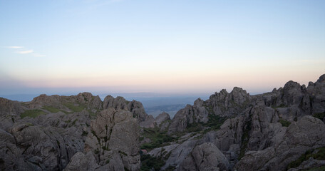 Panorama view of the rocky mountains under a magical sunset sky
