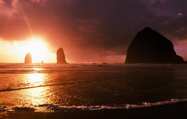 Sunset On Haystack Rock At Cannon Beach