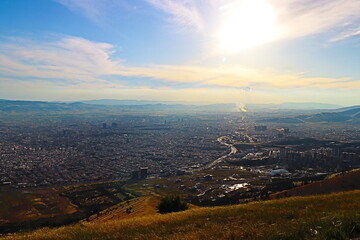 The city of Sulaymaniyah from the top of Mount Azmar with cloudy sky in iraq