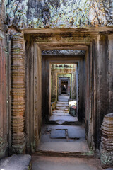 Angkor Wat temple interior in Cambodia, rock entrance corridor.