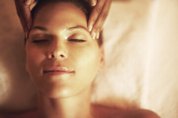Hands, head massage and masseuse with woman at spa for luxury, calm and relaxing pamper routine....