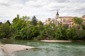 the Arga river with a view of Peralta (Azkoien) city, merindad of Olite, province of Navarra, Spain